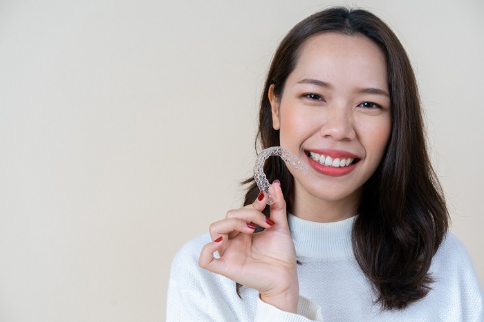 Does Invisalign Require You to Wear a Retainer Forever?